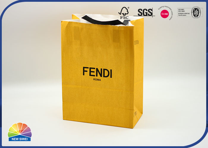 le cadeau de achat orange de papier de 350g emballage met en sac avec le logo adapté aux besoins du client par poignée de papier