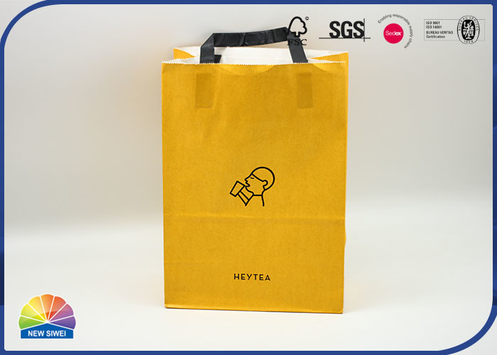 le cadeau de achat orange de papier de 350g emballage met en sac avec le logo adapté aux besoins du client par poignée de papier