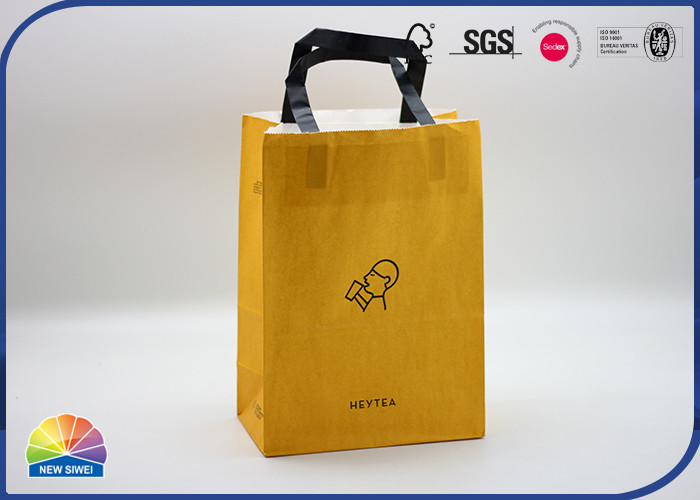 Les sacs à provisions blancs durables de papier d'emballage avec la poignée de coton ont annoncé des sacs de transporteur